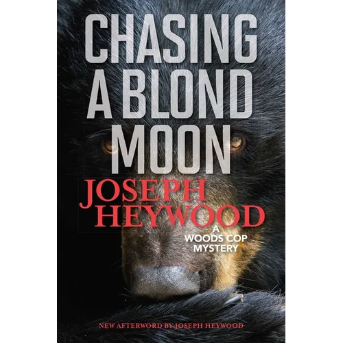 Chasing a Blond Moon: A Woods Cop Mystery - Paperback
