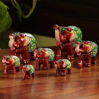 'Seven Tuskers In Maroon' Hand Carved & Hand Painted Showpiece