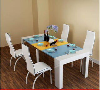 Buy 1table-4-chair Stretch table. Fold the dining table and chairs.
